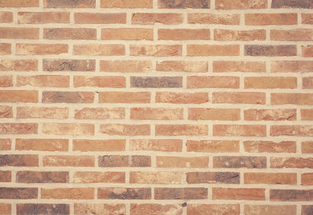 Brown stone brick wall texture and background seamlessの写真素材