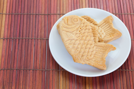 Taiyaki, Japanese fish shaped cake made using regular pancake or waffle batterの写真素材