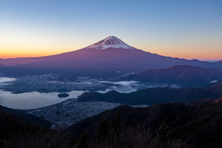 Mt.Fuji and Kawaguchiko lake with sea of mist in autumn seasonの写真素材