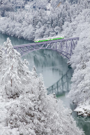 Japan mountain and snow with local train in winter season at Mishima town , Fukushima prefectureのeditorial素材