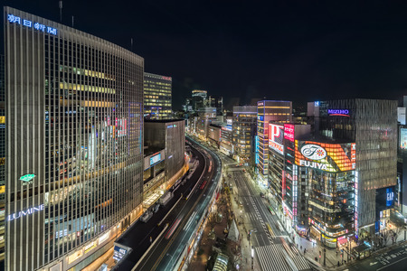 TOKYO, JAPAN - January 18 , 2017 : Cityscape in the Ginza District. The district offers high end retail shopping.のeditorial素材