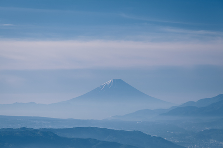 Mountain Fuji with morning mist in spring seasonの写真素材