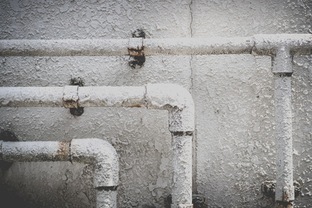 Old metal water pipeの写真素材