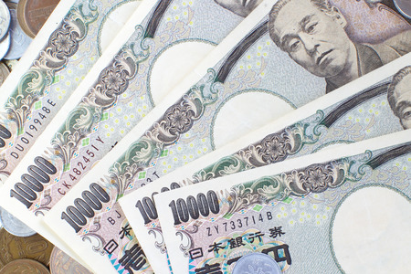 Close - up Japanese yen banknotes and Japanese yen coinの写真素材