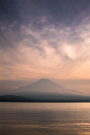 Mountain Fuji with reflection at Lake Yamanakako in sunsetの写真素材