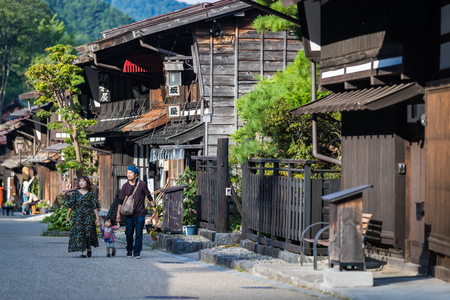Narai-juku, Japan - September 4, 2017: Picturesque view of old Japanese town with traditional wooden architecture. Narai-juku post town in Kiso Valley, Japanのeditorial素材