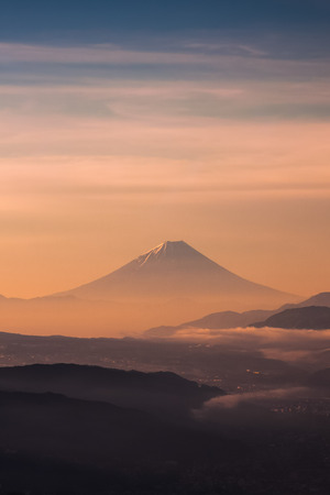 Mountain Fuji with morning mist in spring seasonの写真素材