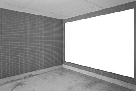 Parking garage underground interior with blank billboard	の写真素材