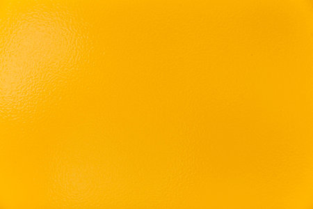 Yellow metal wall texture and background. Modern Yellow painted steel plateの写真素材