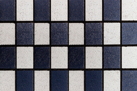 White and black striped wall tiles pattern and seamless background