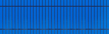 Panorama of Modern blue stone wall with stripes texture and seamless background