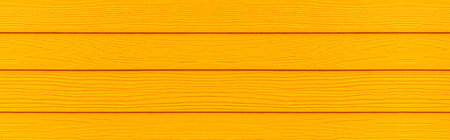 Panorama of Vintage yellow wooden wall texture and seamless backgroundの写真素材