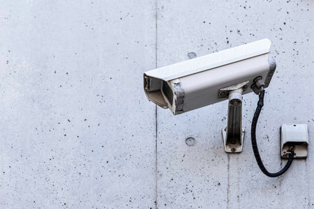 Video camera security system on the wall of the building