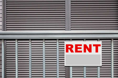 Rental Real Estate Sign in Front of houseの写真素材