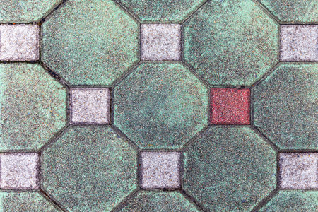 Vintage green cobblestone pavement pattern and background