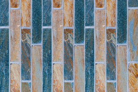 Multi - colored ceramic tiled wall pattern and seamless background