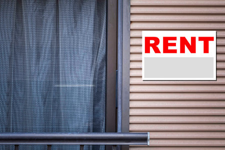 Rental Real Estate Sign in Front of houseの写真素材