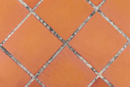Brown ceramic floor tile pattern and background seamlessの写真素材
