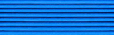Panorama of Old blue wooden fence shutter lattice texture and background seamless