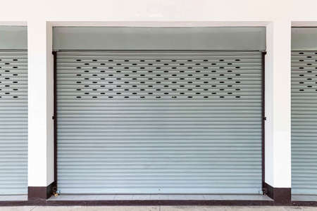 The gray steel shutter door is closedの写真素材