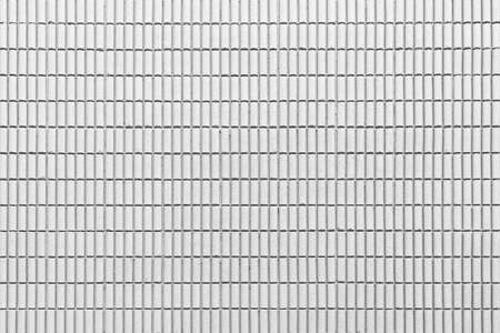 Vintage white brick tile wall pattern and background seamlessの写真素材