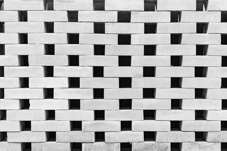 Vintage white stone brick tile wall pattern and background seamlessの写真素材
