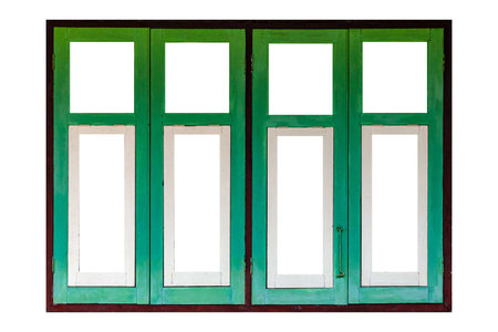Old white wooden windows and light cream cement walls