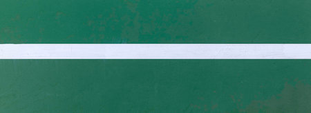 Panorama of A close up of white lines on the tennis court floor