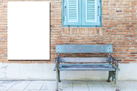 A blank billboard next to the waiting benchの写真素材