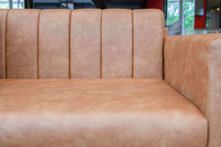 Brown leather sofa in the reception area at homeの写真素材