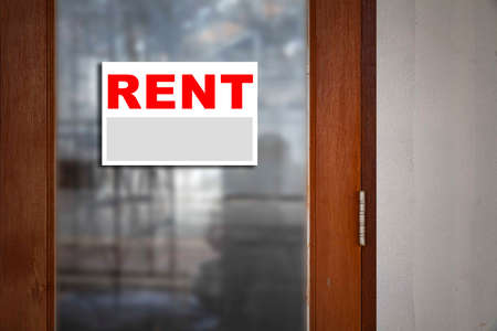 Rental sign attached to the front of the shopの写真素材