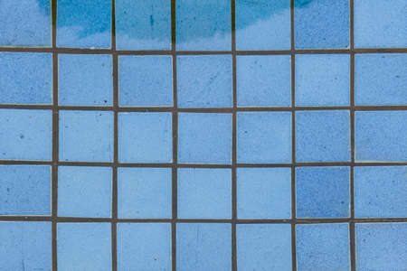 Blue Glazed Swimming Pool Floor Tiles texture and background seamlessの写真素材