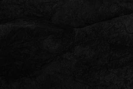 Dark grey black slate background or texture. Black granite slabs backgroundの写真素材