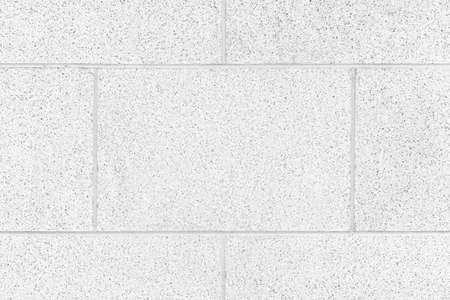 White granite tiled wall with vintage pattern texture and background seamlessの写真素材