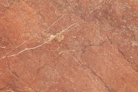 Natural stone with brown rough baking stone from garden decoration stone texture and background seamlessの写真素材