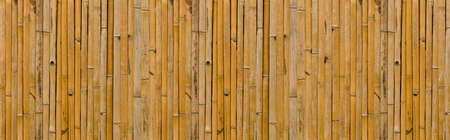 Panorama of Brown old Bamboo fence texture and background seamlessの写真素材