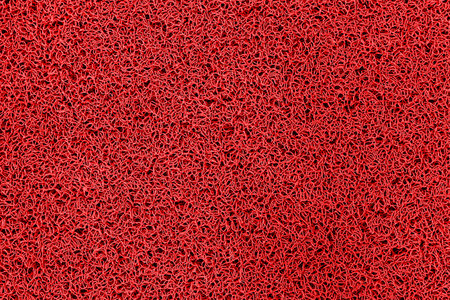 Red plastic doormat texture and background seamlessの写真素材