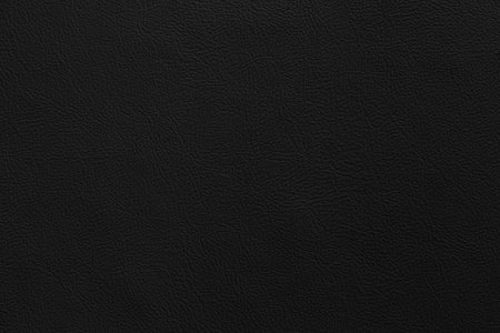 Black genuine cow leather of the sofa texture and background seamlessの写真素材