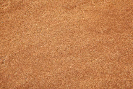 Natural stone with brown rough baking stone from garden decoration stone texture and background seamlessの写真素材