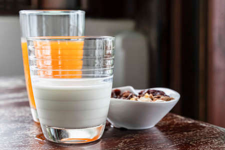 Western breakfast set, fresh milk, freshly squeezed orange juice and cornflakesの写真素材