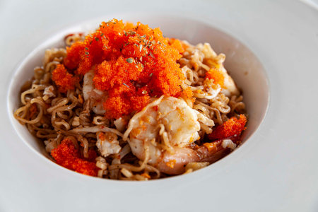 A plate of instant noodles stir-fried with fresh shrimp and ebiko