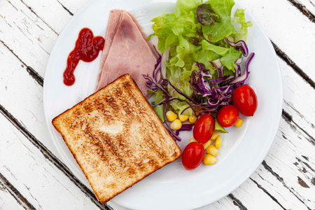 Western breakfast set , Bread with ham and lettuceの写真素材