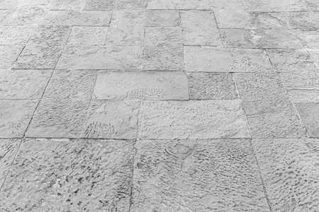 Perspective View Monotone white Brick Stone Pavement on The Ground for Street Roadの写真素材