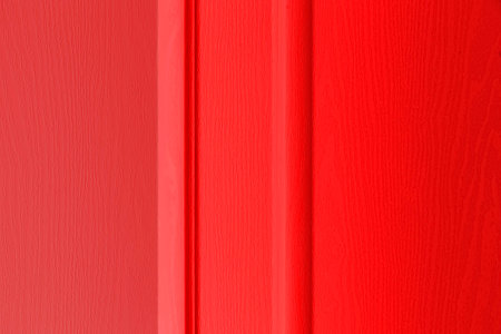 Red wood color texture vertical for background. Surface light clean of table top view. Natural patterns for design art work and interior or exterior. Grunge old red wood board wall patternの写真素材