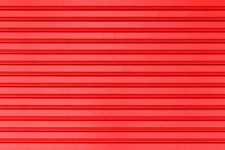 Red Corrugated metal background and texture surface or galvanize steelの写真素材