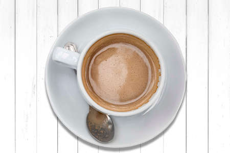 The coffee mug placed on the wood table topの写真素材