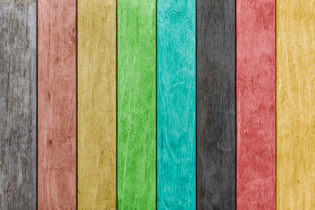 Old wooden house wall with many colors in vintage style texture and background seamlessの写真素材