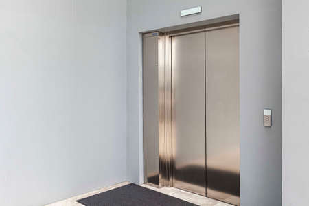The entrance hall of the elevator in a modern buildingの写真素材