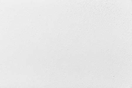 White painted concrete wall in vintage style texture and background seamlessの写真素材