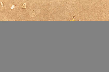 Sand texture. Sandy beach for background. Top view. Natural sand stone texture background. sand on the beach as background. Wavy sand background for summer designsの写真素材